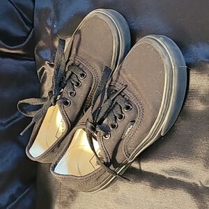 Black off the wall kids vans tie sneakers